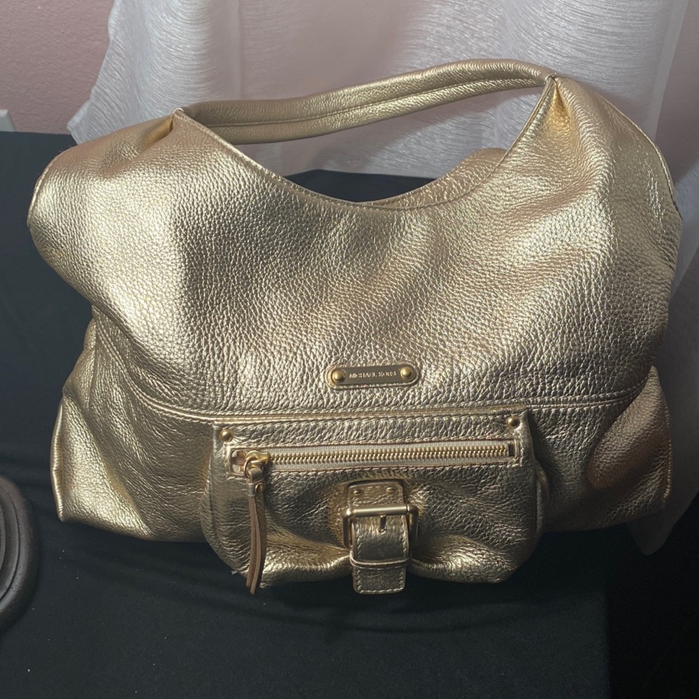 Michael Kors , gold leather handbag. Medium size.